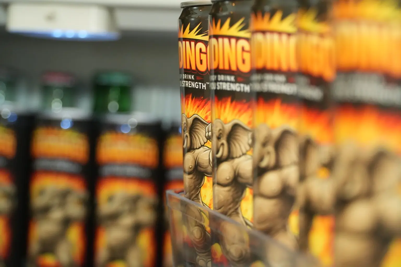 Rows of Mandingo Original cans stocked and ready